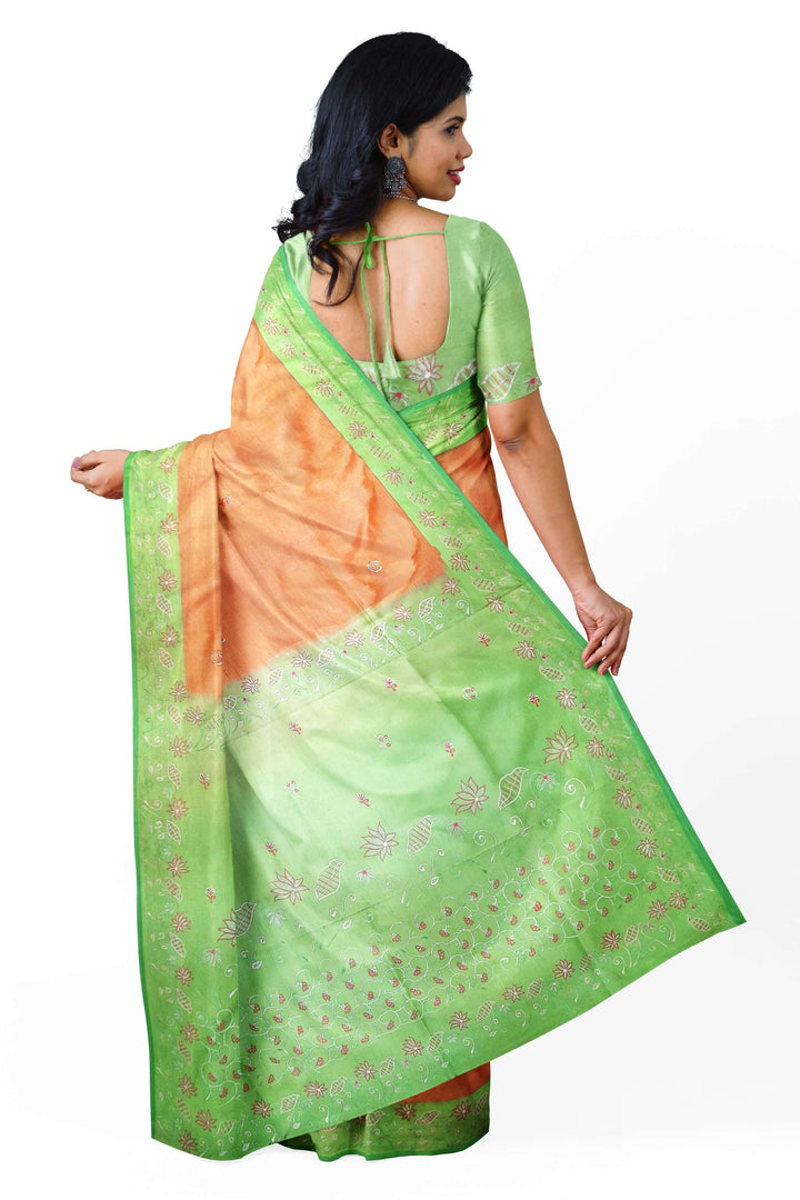 Pure silk saree in peach with embroidery work  all over the body & pallu