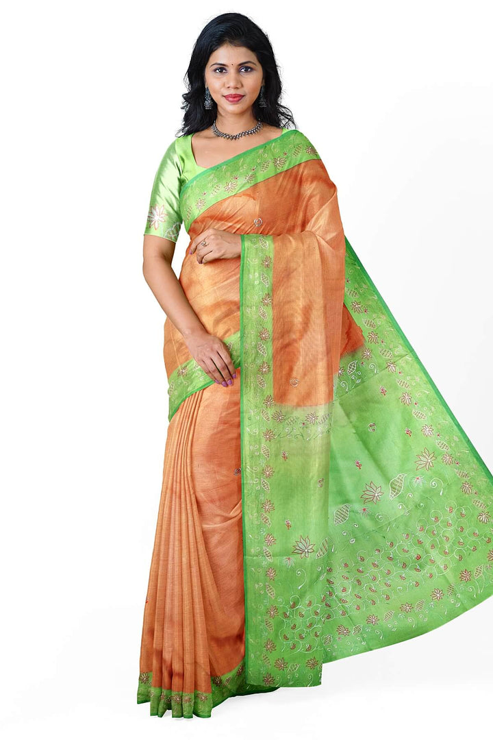 Pure silk saree in peach with embroidery work  all over the body & pallu
