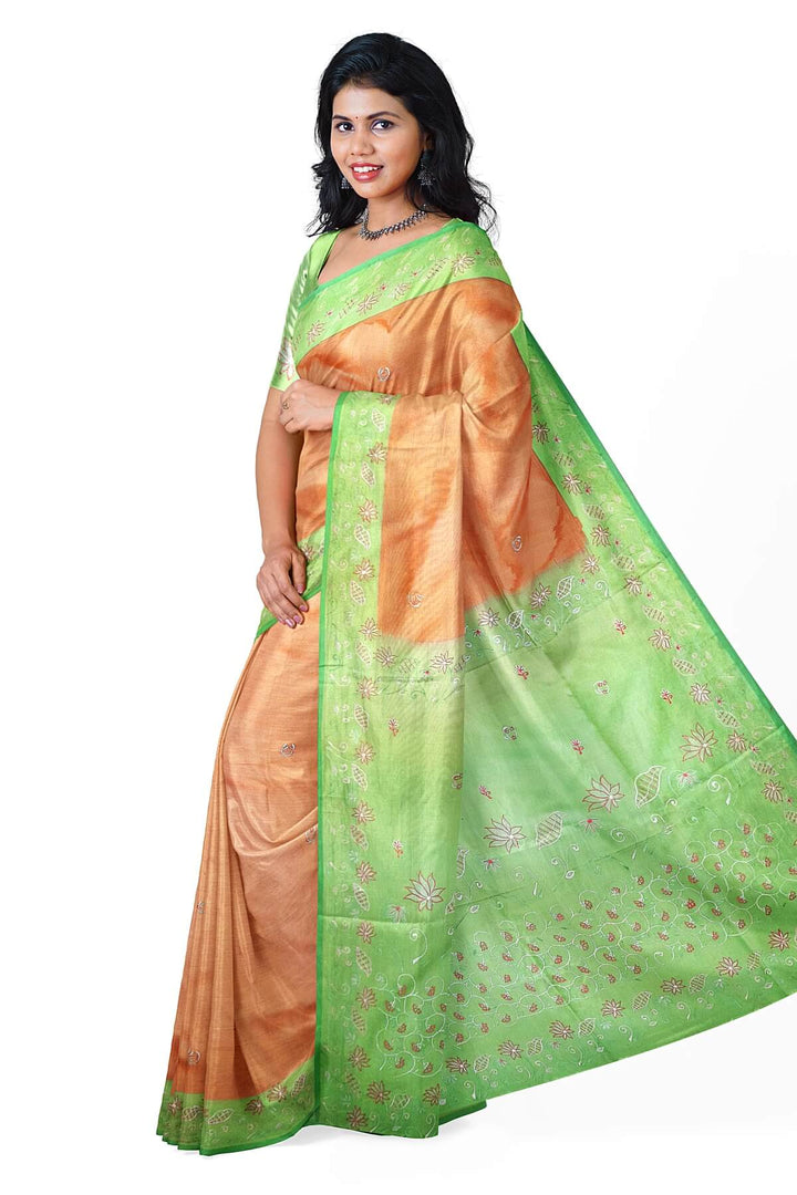 Pure silk saree in peach with embroidery work  all over the body & pallu