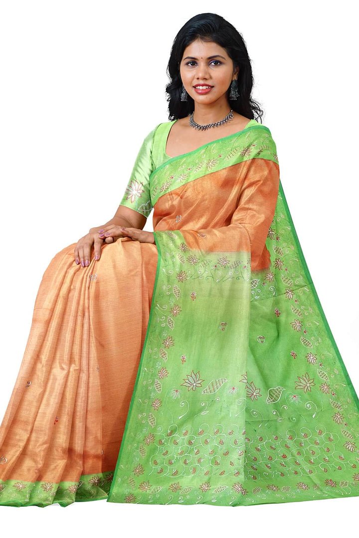 Pure silk saree in peach with embroidery work  all over the body & pallu