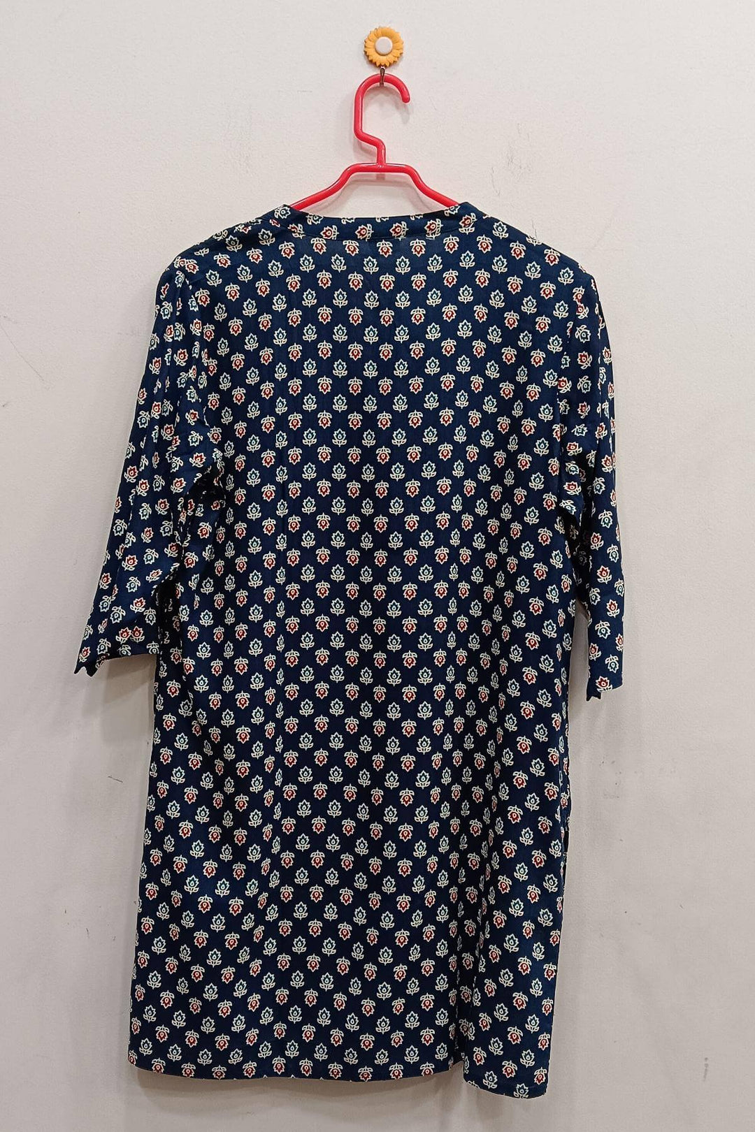 Rayon tunic in blue with small floral motifs