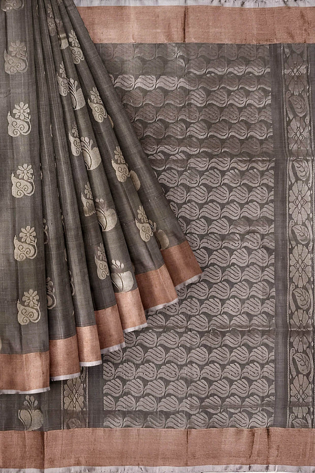 Handwoven Uppada pure silk saree in grey with  floral motifs .