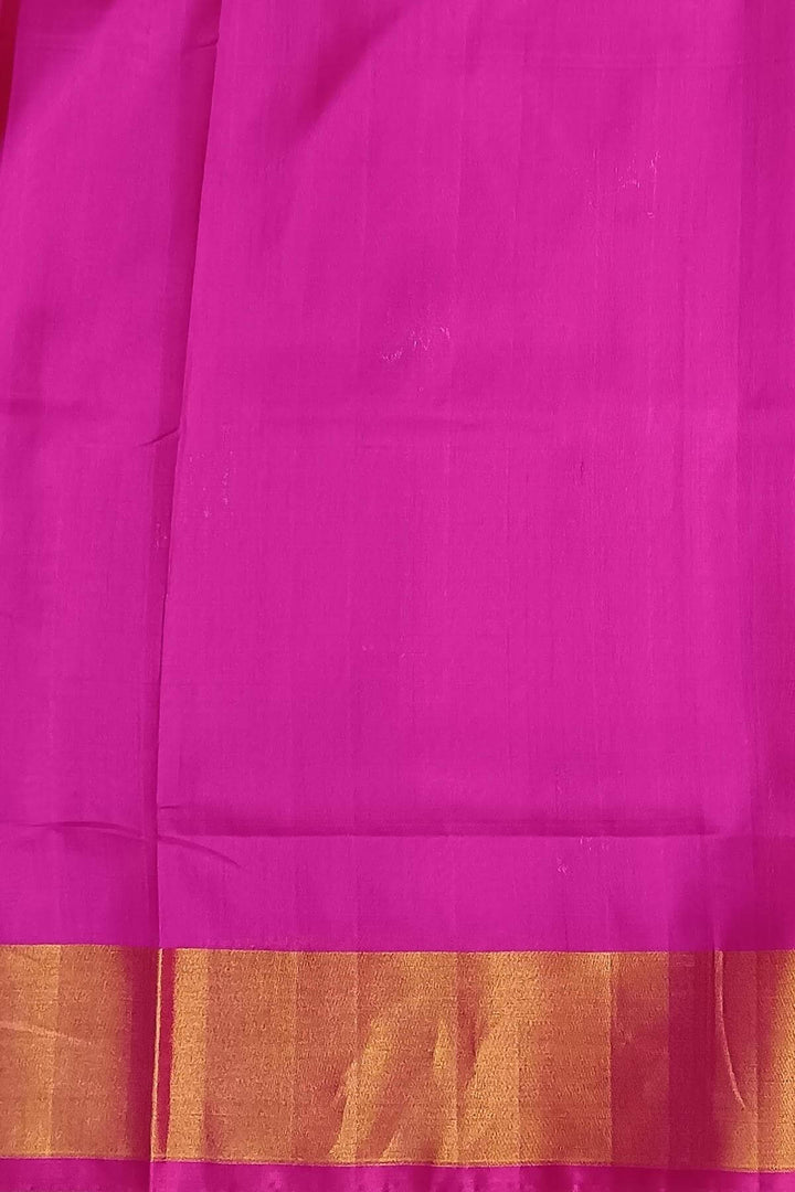 Handwoven Uppada pure silk saree in yellow in fine checks with gold & silver motifs.