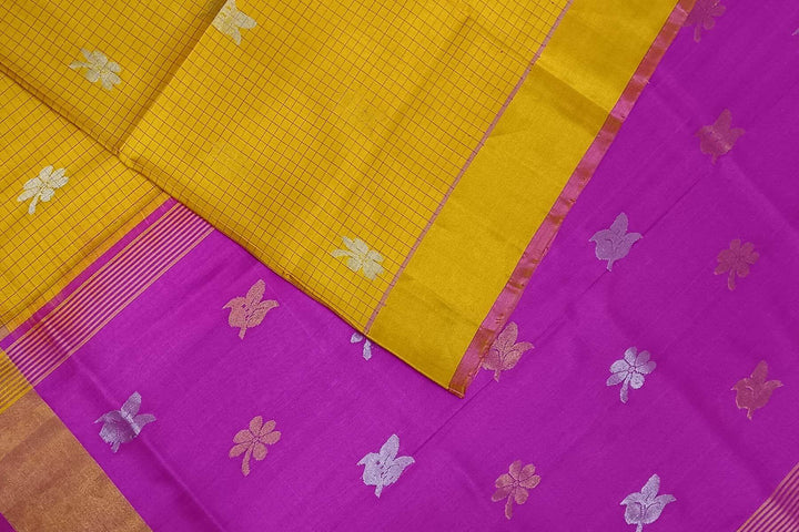 Handwoven Uppada pure silk saree in yellow in fine checks with gold & silver motifs.