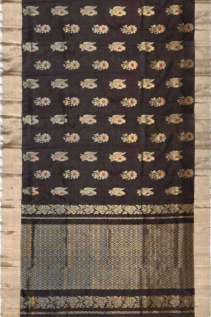 Handwoven Uppada pure silk saree in black with  floral motifs .