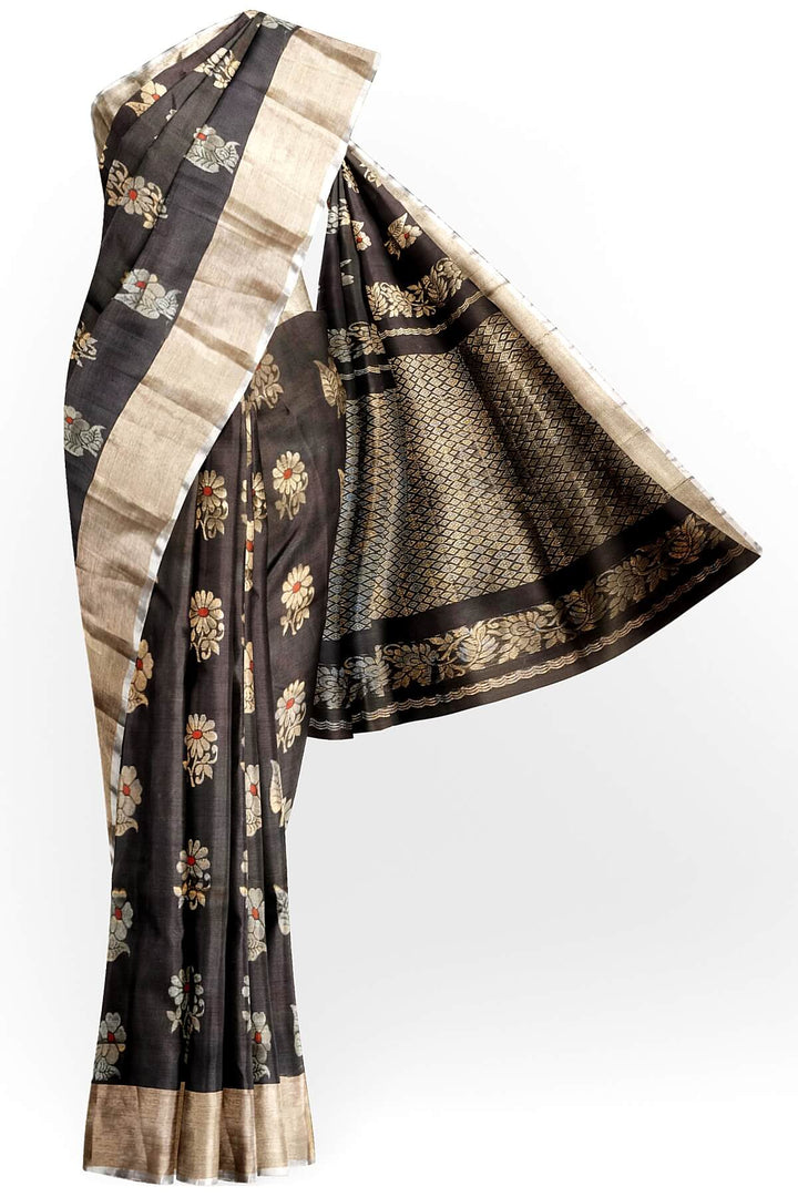 Handwoven Uppada pure silk saree in black with  floral motifs .