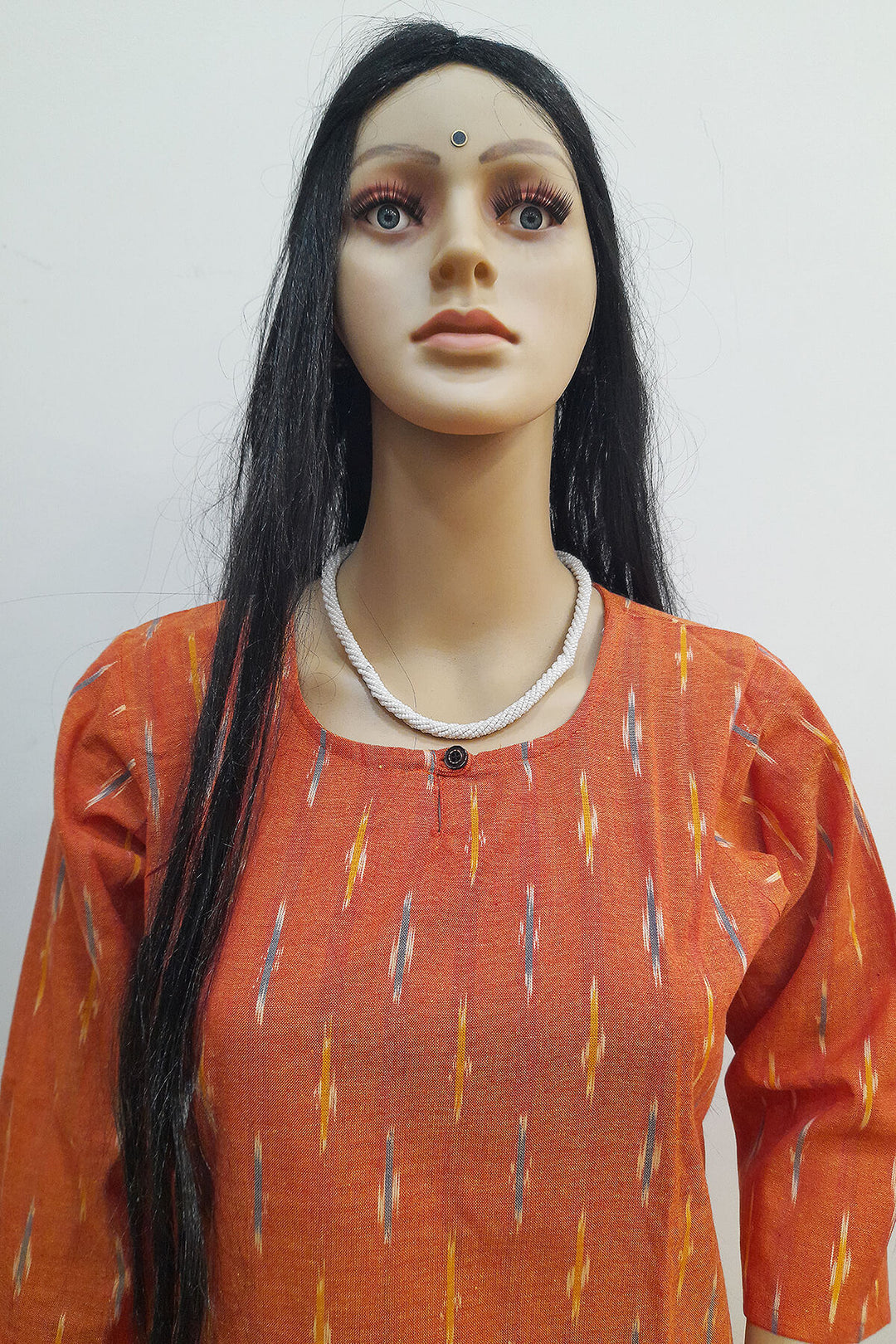 Handwoven ikat cotton kurti in straight cut in rust