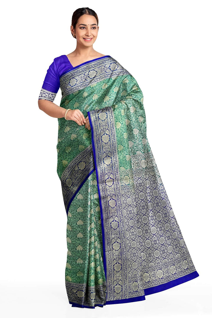 Handloom Banarasi silk saree in satin weave in red with floral motifs all over the body.