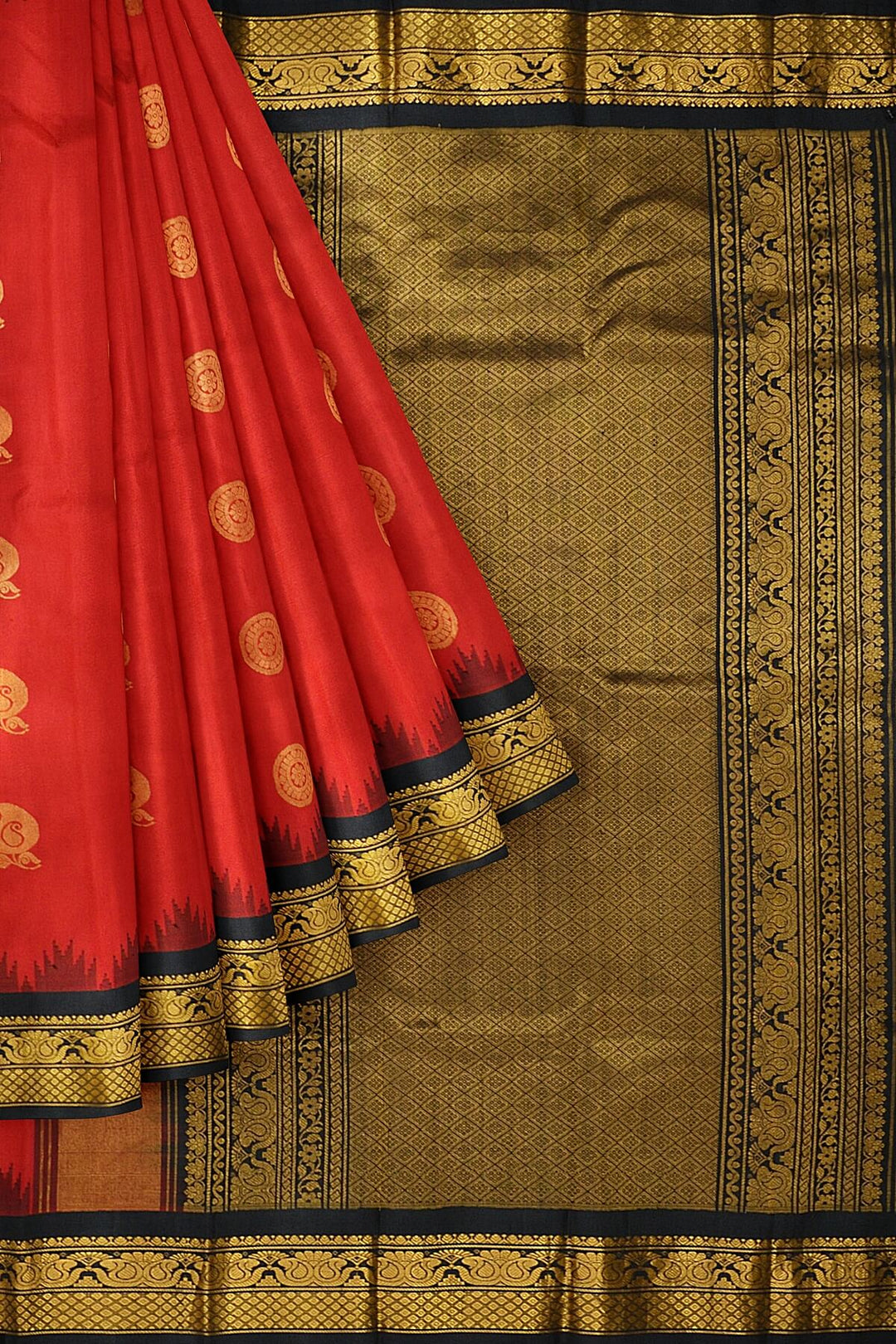 Handwoven Gadwal pure silk saree in red with disc & floral motifs and rich pallu with temple border