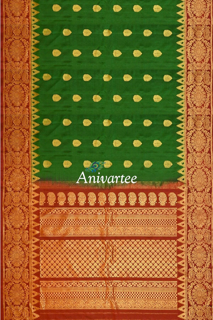 Handwoven Gadwal pure silk saree in bottle green with gold motifs
