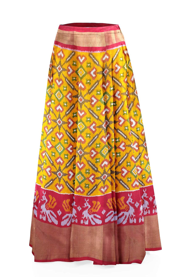 Handwoven Ikat pure silk unstitched lehenga material in mustard  in pan bhat pattern