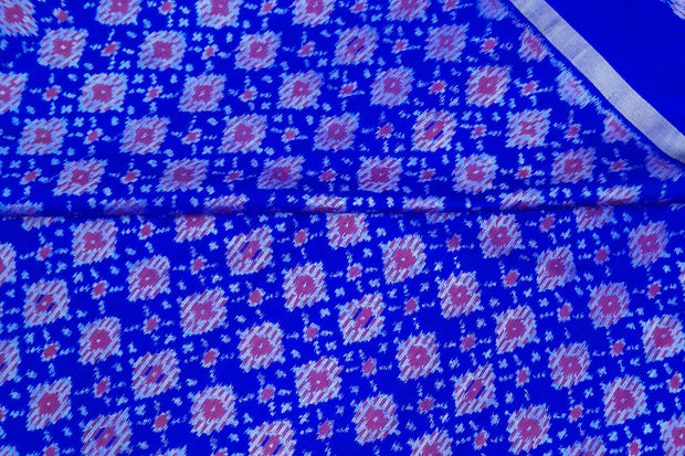 Handwoven Ikat pure silk fabric in diamond pattern in blue with border