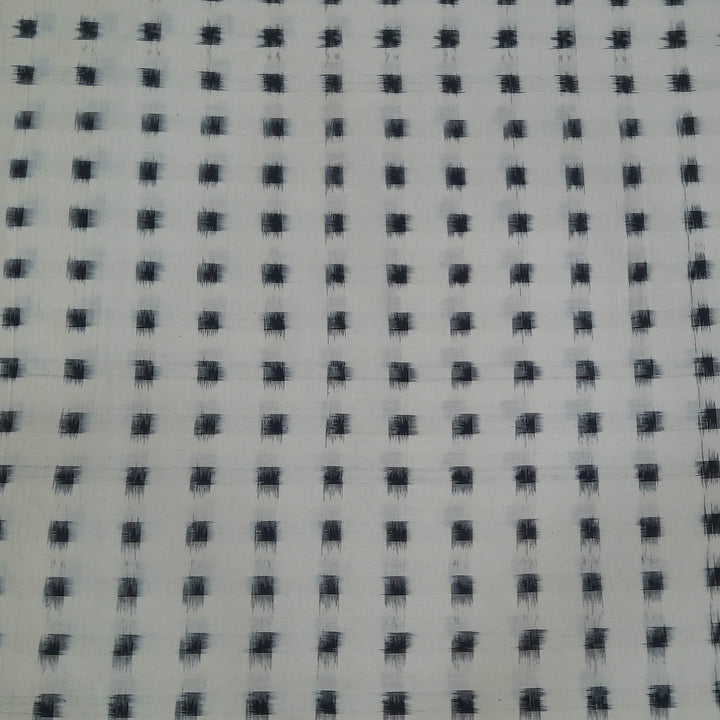 Handwoven double ikat pure cotton fabric in off white with black squares