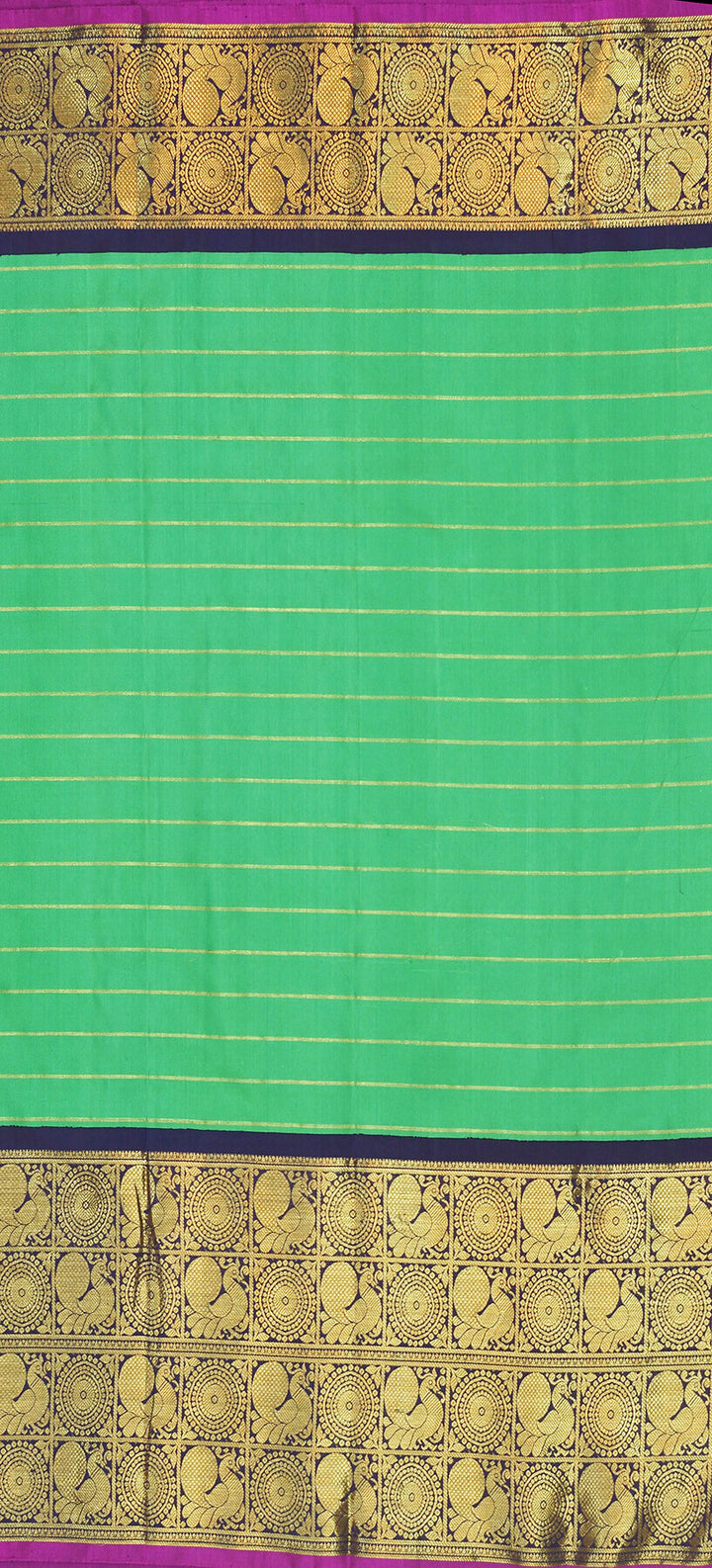 Kanchi pure silk pure zari saree in green with zari stripes