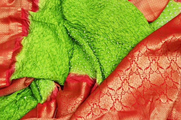Bandhini pure silk saree in green with Kanchi patterned  border