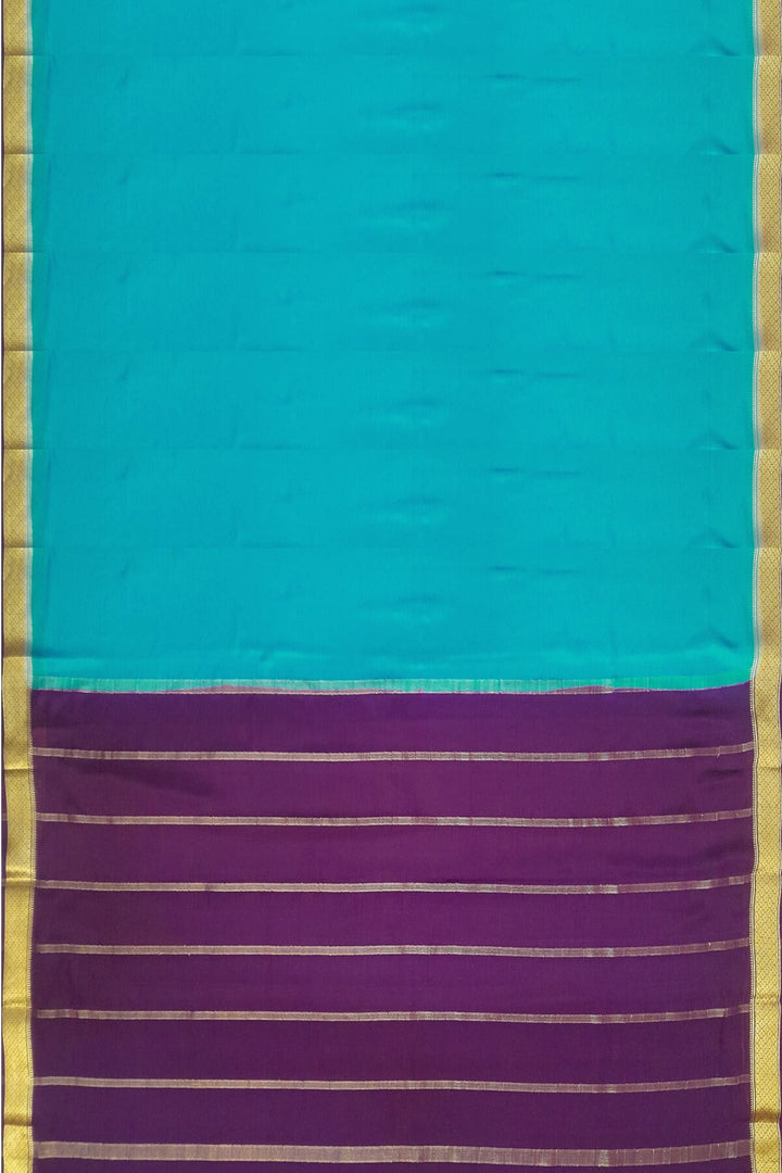 Mysore  crepe pure silk saree in  blue  with contrast pallu in purple