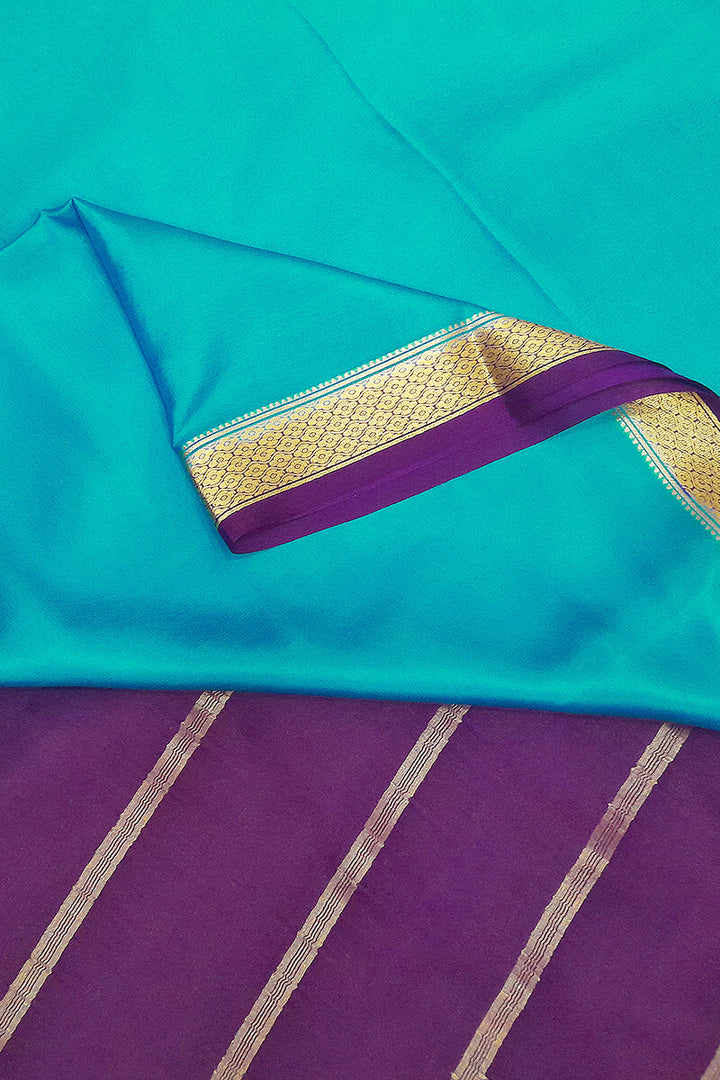 Mysore  crepe pure silk saree in  blue  with contrast pallu in purple