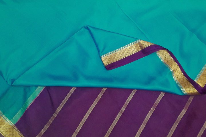 Mysore  crepe pure silk saree in  blue  with contrast pallu in purple