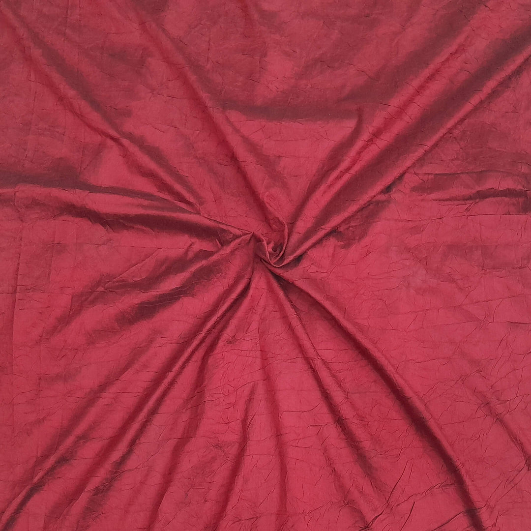 Crushed silk fabric in maroon