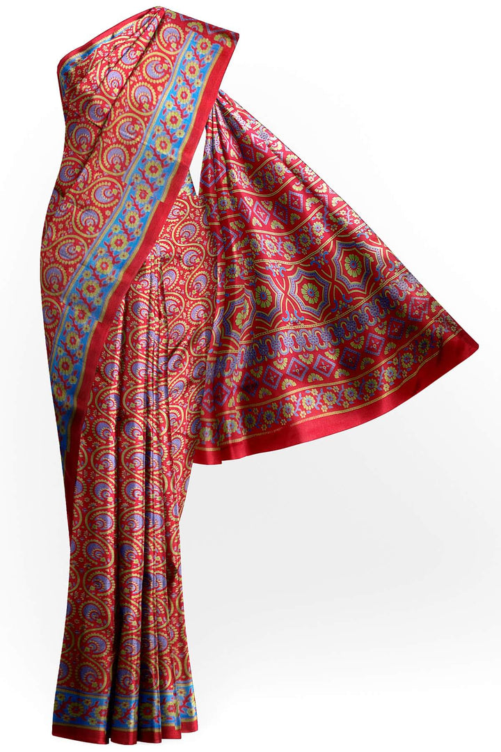 Pure silk saree in red & blue with round & floral motifs   in satin weave