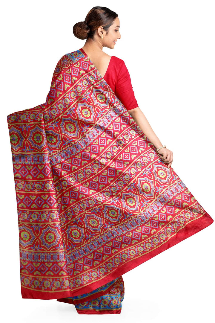 Pure silk saree in red & blue with round & floral motifs   in satin weave