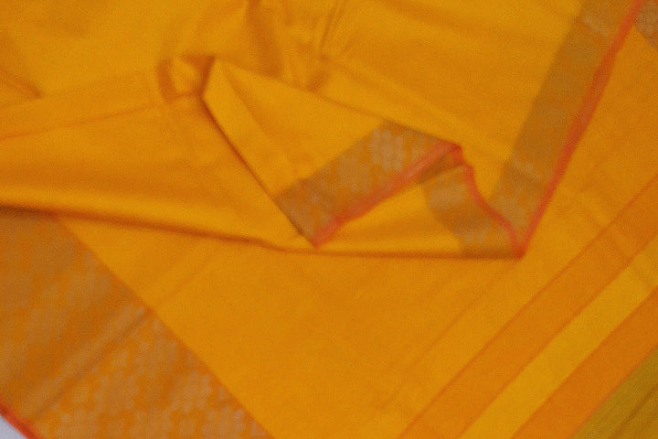 Handloom desi tussar pure silk saree in yellow with floral pattern in border