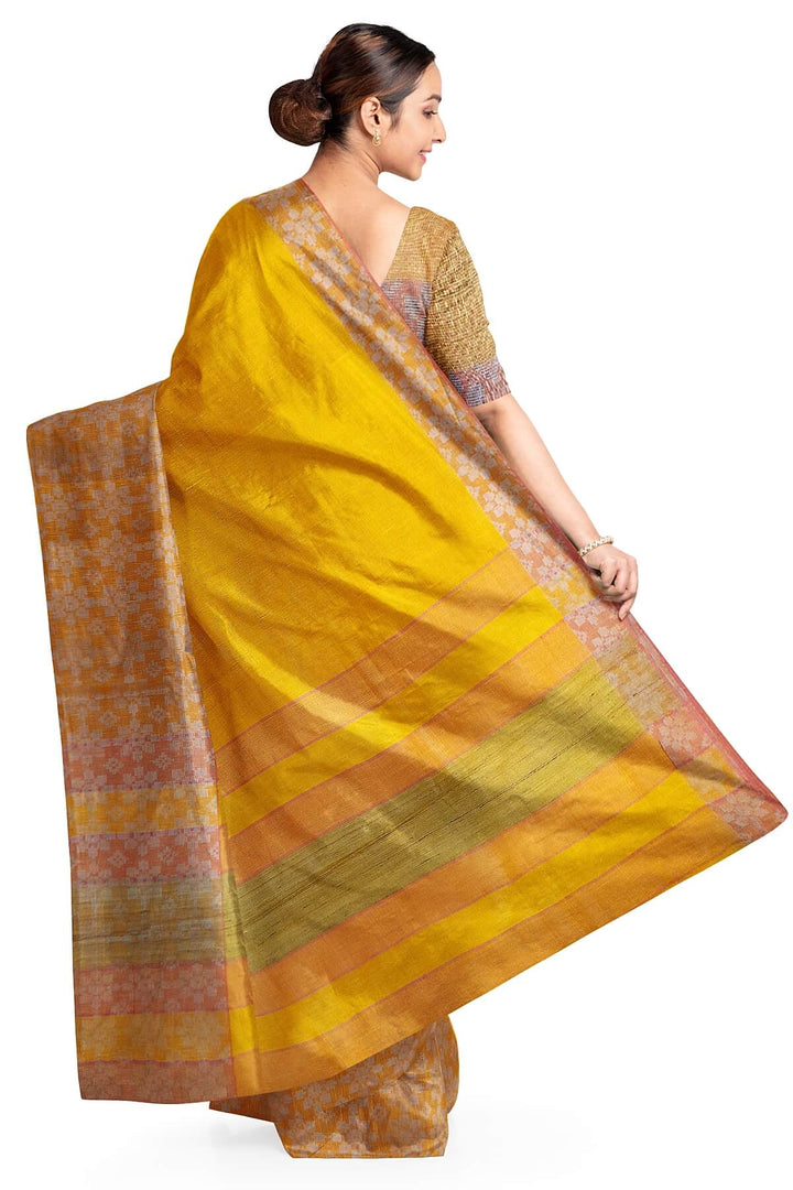 Handloom desi tussar pure silk saree in yellow with floral pattern in border