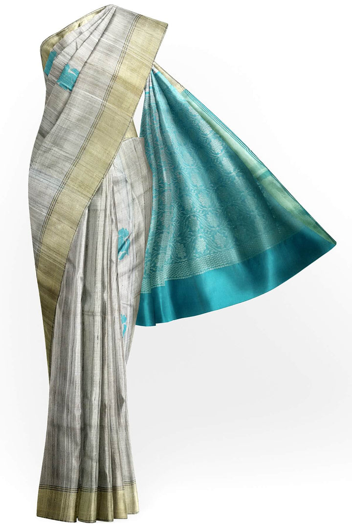 Desi tussar pure silk saree in teal blue  colour floral motifs on the body and a zari pallu in floral pattern