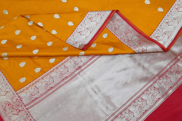 Handloom Banarasi katan pure silk saree in mustard colour with floral motifs