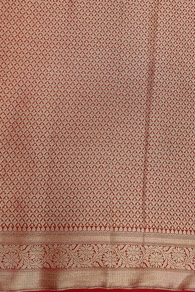 Banarasi georgette saree in bottle green with small  motifs