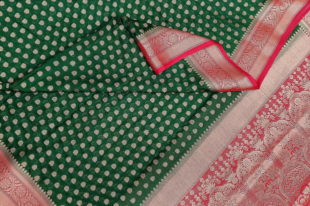 Banarasi georgette saree in bottle green with small  motifs