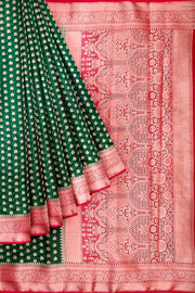 Banarasi georgette saree in bottle green with small  motifs