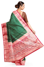 Banarasi georgette saree in bottle green with small  motifs