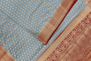 Banarasi georgette saree in ash grey with small  motifs