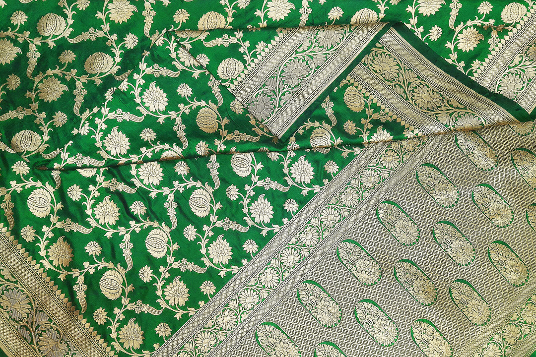 Handloom Banarasi pure silk saree in green in  jaal pattern
