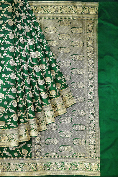 Handloom Banarasi pure silk saree in green in  jaal pattern