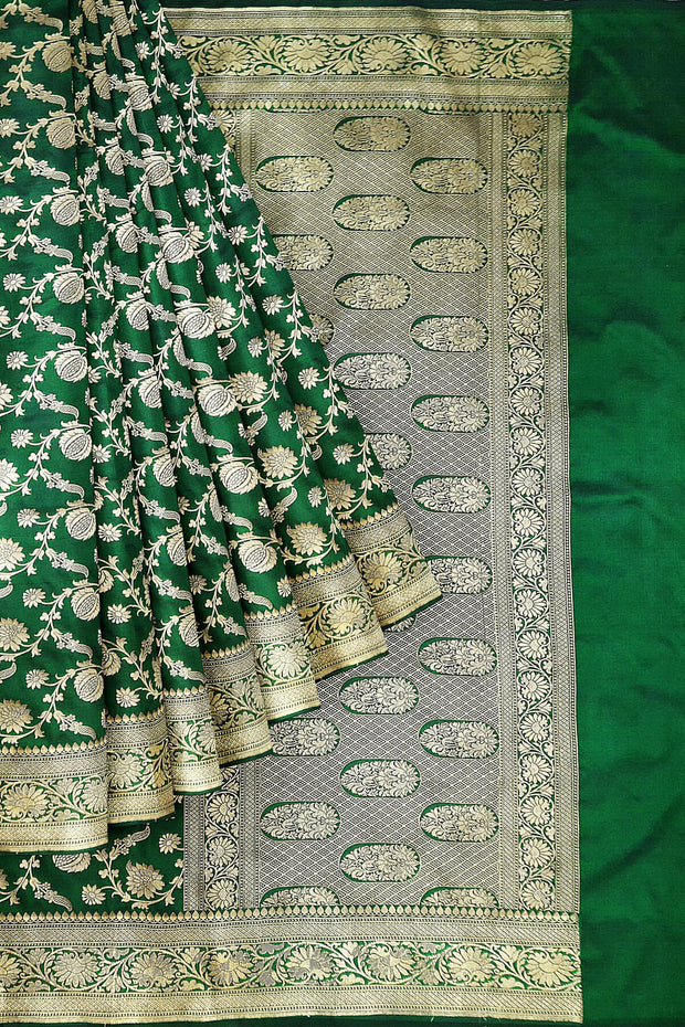 Handloom Banarasi pure silk saree in green in  jaal pattern