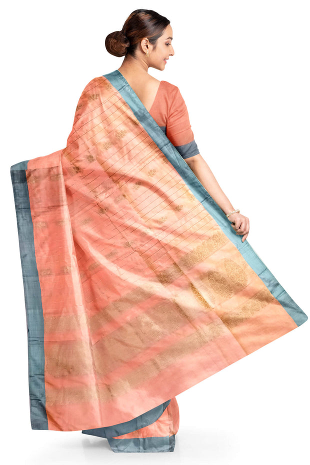 Banarasi katan pure silk saree in peach with stripes & floral motifs in gold.