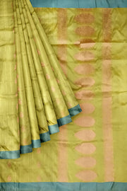 Banarasi katan pure silk saree in mehndi green  with stripes & floral motifs in gold.
