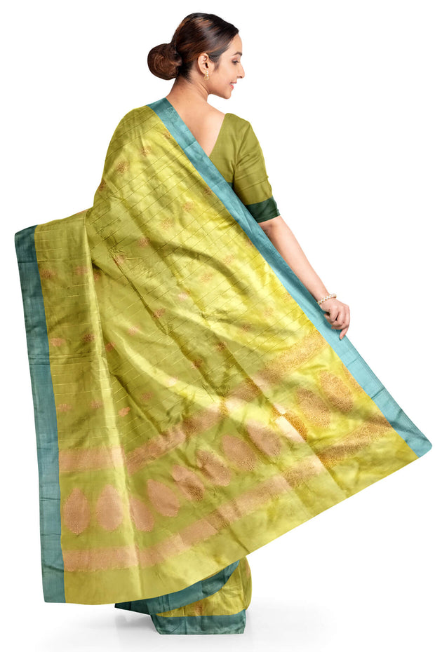 Banarasi katan pure silk saree in mehndi green  with stripes & floral motifs in gold.