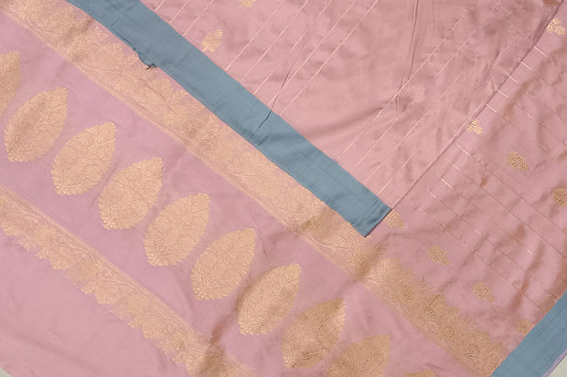 Banarasi katan pure silk saree in pink  with stripes & floral motifs in gold.