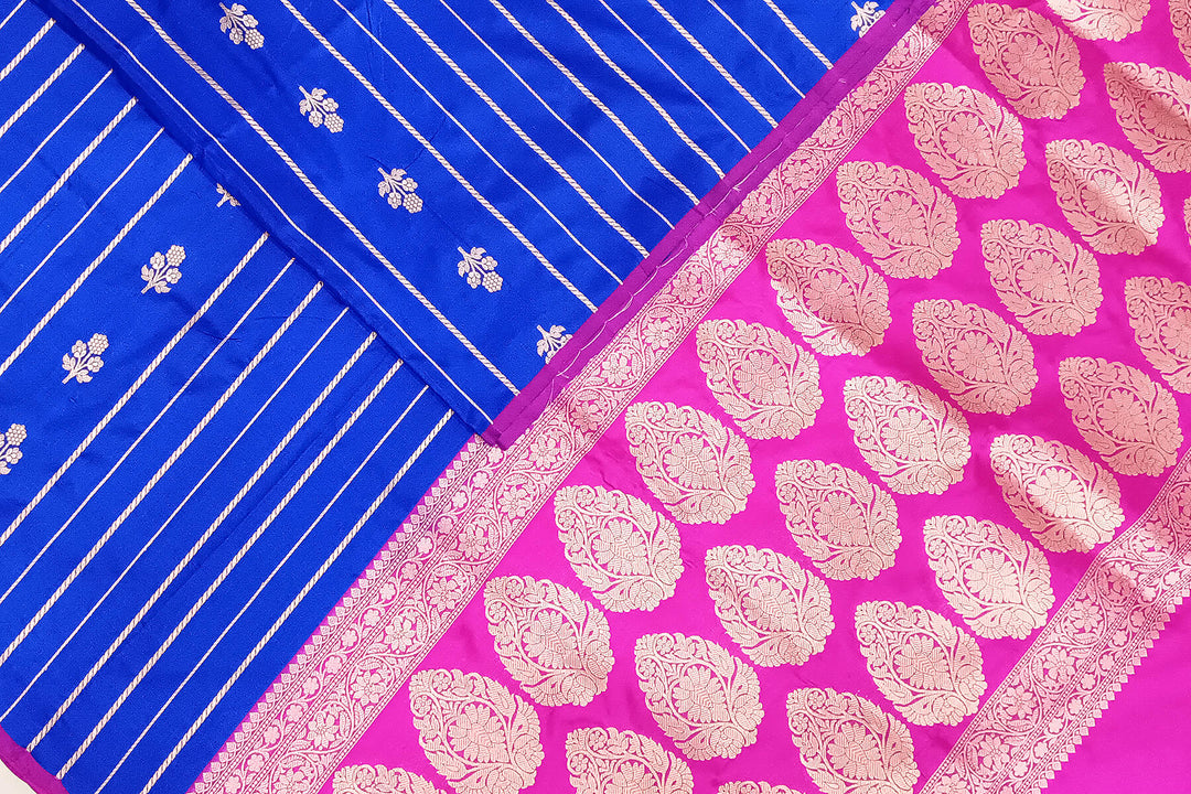 Banarasi katan pure silk saree in royal blue with stripes & floral motifs in gold.