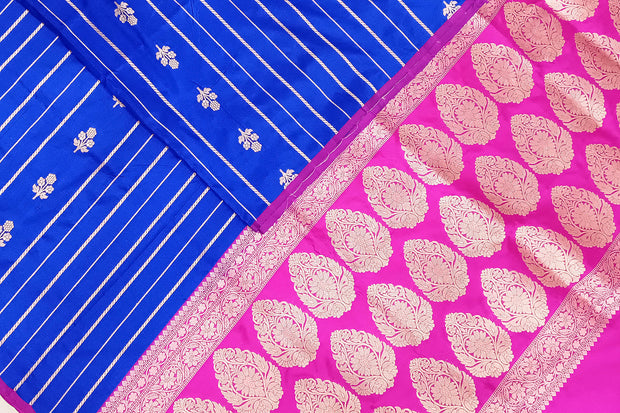 Banarasi katan pure silk saree in royal blue with stripes & floral motifs in gold.