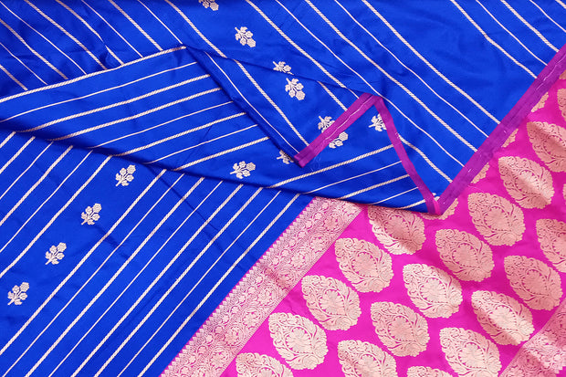 Banarasi katan pure silk saree in royal blue with stripes & floral motifs in gold.