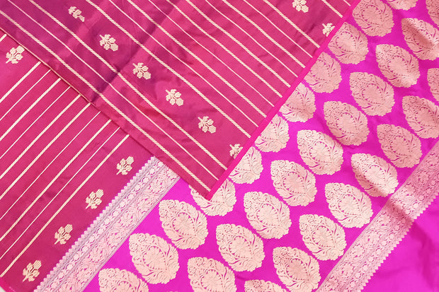 Banarasi katan pure silk saree in double shaded purple with stripes & floral motifs in gold.