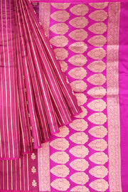 Banarasi katan pure silk saree in double shaded purple with stripes & floral motifs in gold.
