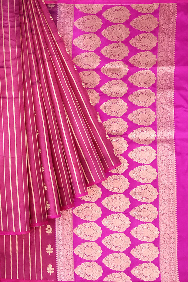 Banarasi katan pure silk saree in double shaded purple with stripes & floral motifs in gold.