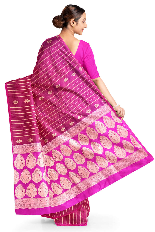 Banarasi katan pure silk saree in double shaded purple with stripes & floral motifs in gold.