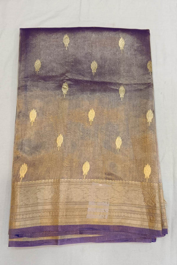 Violet silk tissue handloom Banarasi saree with floral motifs in gold.