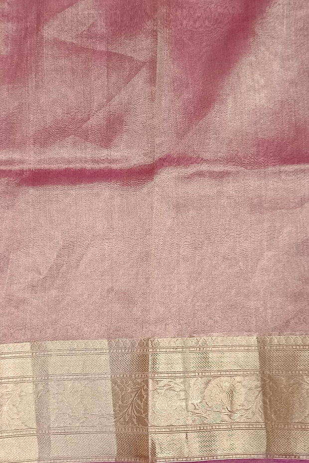 Onion pink silk tissue handloom Banarasi saree with floral motifs in gold.